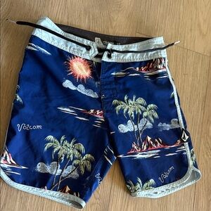 Volcom Navy and Light Blue Tropical Board Shorts. Size 25, boys.